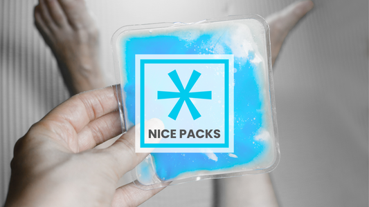 A person holding a Nice Pack looking at his feet