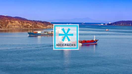A boat on a flat sea with cargo containers on it
